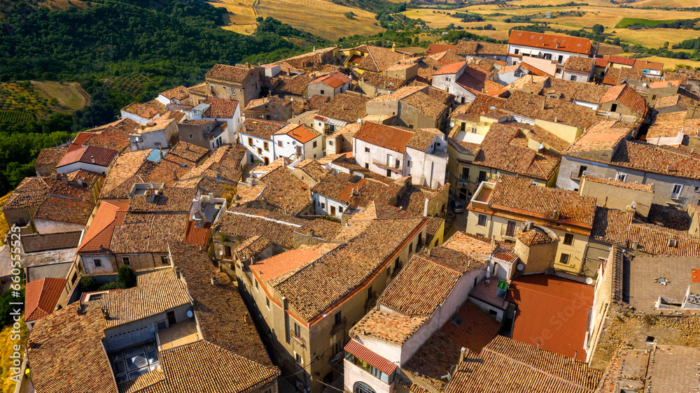 Aerial view of Acerenza town. It's a comune in the province of Potenza, in the Southern Italian region of Basilicata. The houses are built close together and separated by small alleys.