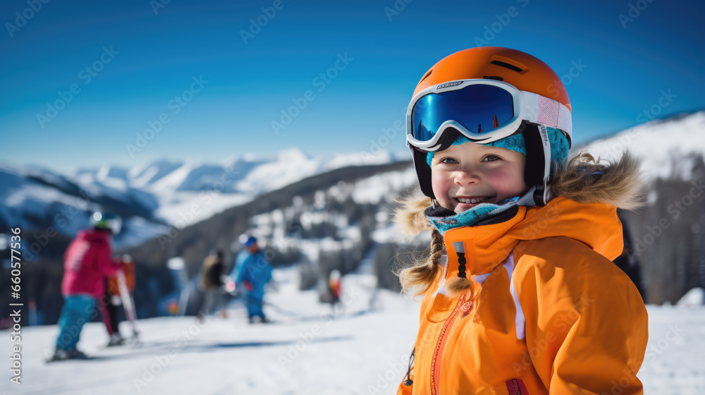Portrait of a kid skier in helmet and winter clothes on the background of snow-covered mountain slope - obrazy, fototapety, plakaty 