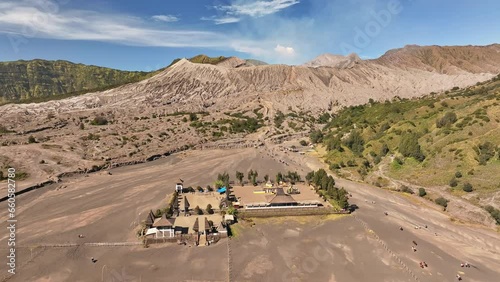 Aerial view fly to Luhur Poten Hindu temple, Bromo volcano, Indonesia photo