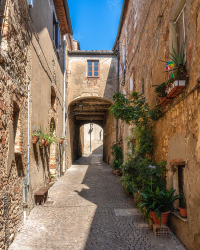 Fototapeta Naklejka Na Ścianę i Meble -  The beautiful village of Bibbona on a sunny summer afternoon. Province of Livorno, Tuscany, Italy.