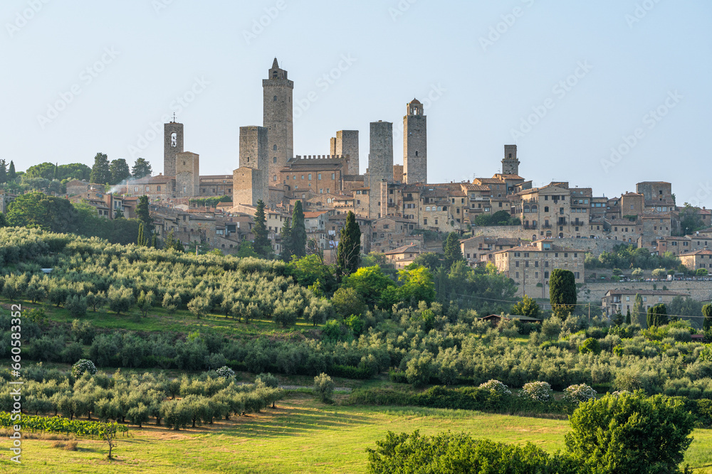 The marvelous city of San Giminiano with all its towers on a sunny summer afternoon. Province of Siena, Tuscany, Italy.