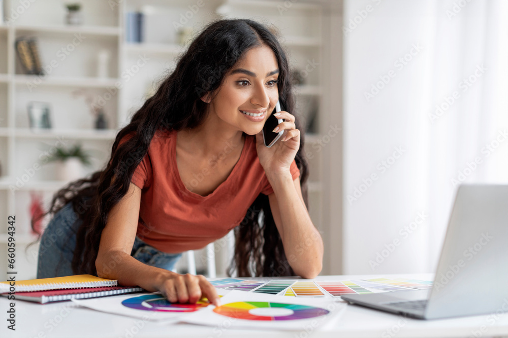 Freelance Designer Young Indian Woman Balancing Tech and Talk Freelance Designer Young Indian Woman Balancing Tech and Talk