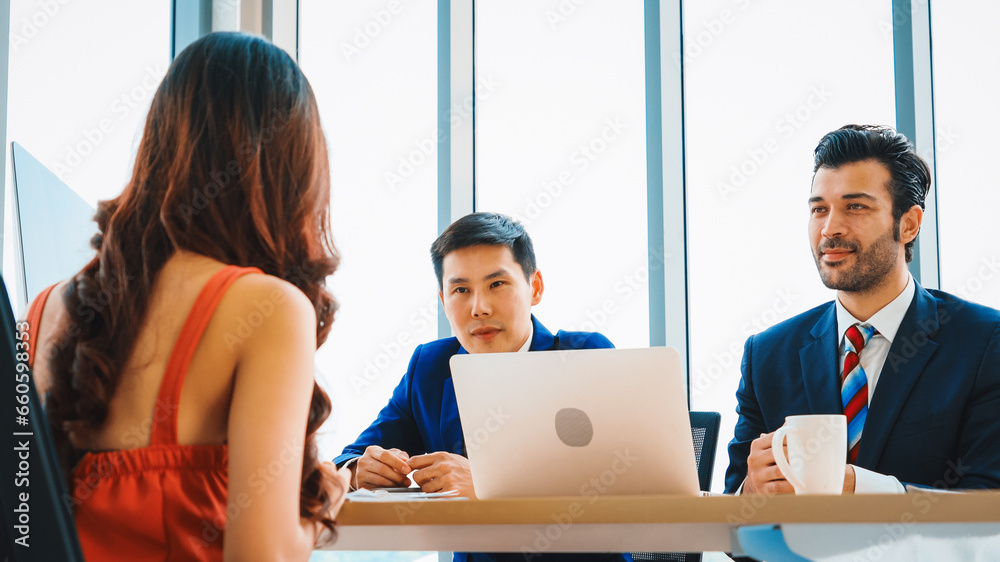 Job seeker in job interview meeting with manager and interviewer at corporate office. The young interviewee seek for professional career job opportunity . Human resources and recruitment concept. Jivy