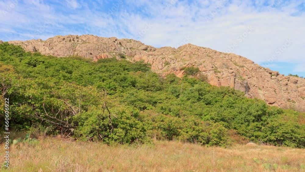 Daytime landscape of the Wichita Mountains National Wildlife Refuge Daytime landscape of the Wichita Mountains National Wildlife Refuge