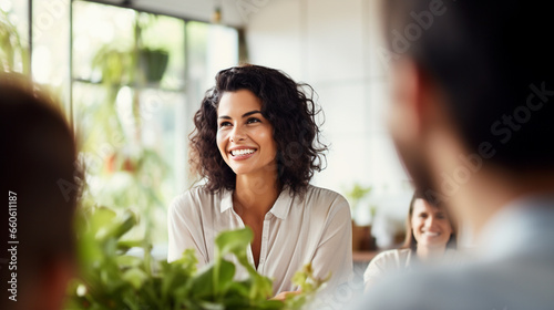 An optimistic healthy woman vegan leading a discussion on the benefits of plant-based nutrition, blurred background, with copy space photo
