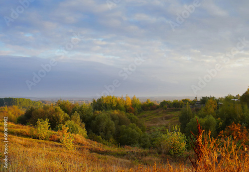 Beautiful landscape with autumn view of meadows and hills