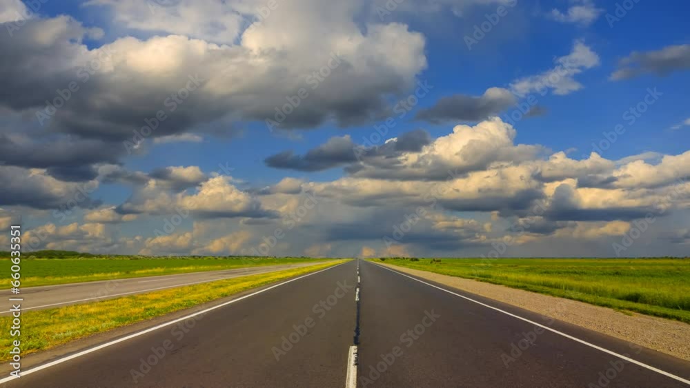 long asphalt road under blue cloudy sky time lapse scene long asphalt road under blue cloudy sky time lapse scene