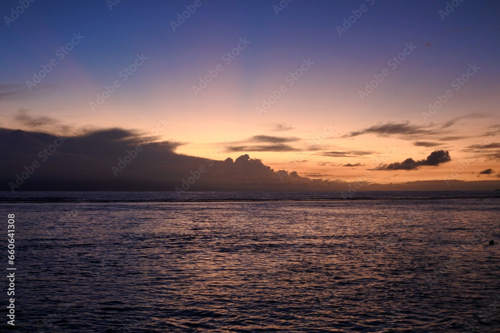 Fototapeta premium Seascape at sunset. Sunset on the island of La Digue.