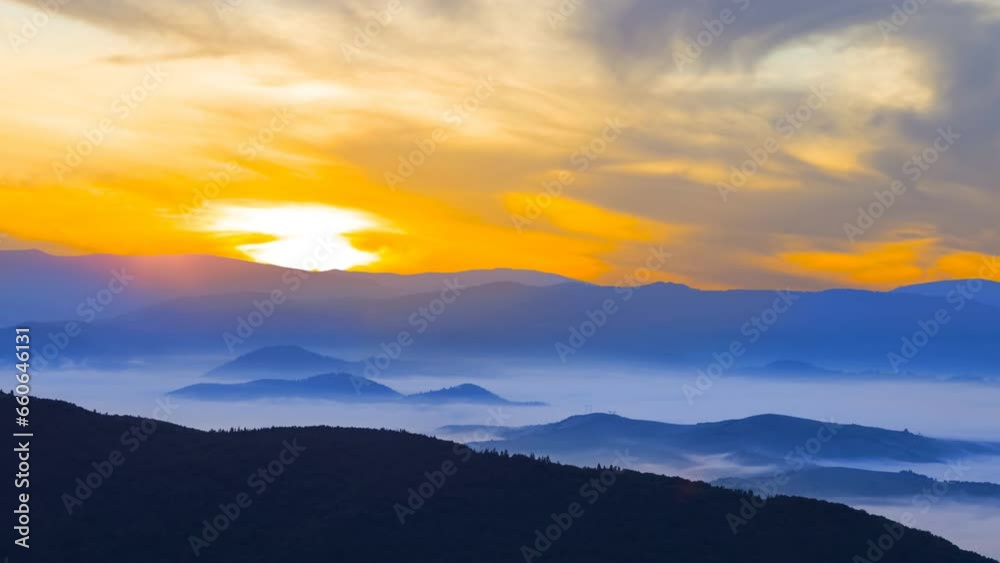 mountain valley in blue mist at the early morning, natural travel time lapse scene