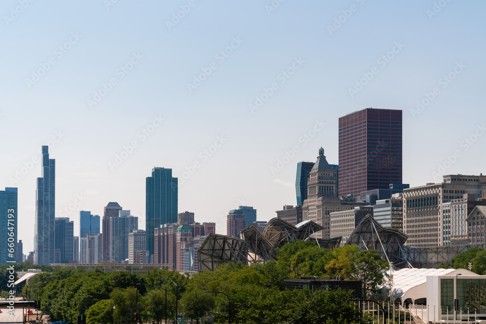 Chicago skyline panorama from Park at day time. Chicago, Illinois, USA. Skyscrapers of financial district, a vibrant business neighborhood.