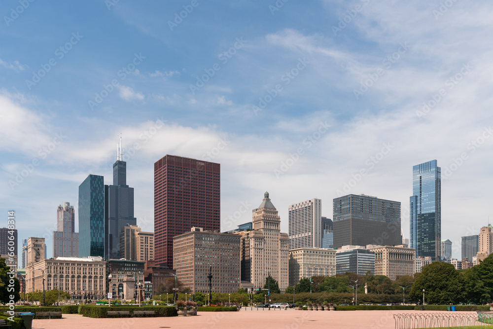 Chicago skyline panorama from Park at day time. Chicago, Illinois, USA. Skyscrapers of financial district, a vibrant business neighborhood.