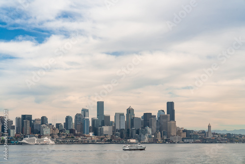 Waterfront Seattle skyline with Great wheel view. Skyscrapers of financial downtown at day time, Washington, USA. A vibrant business neighborhood © VideoFlow