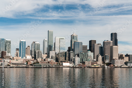 Waterfront Seattle skyline with Great wheel view. Skyscrapers of financial downtown at day time  Washington  USA. A vibrant business neighborhood