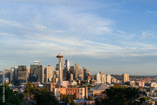 Seattle skyline panorama with iconic view observation tower as seen from Kerry Park. Skyscrapers of financial downtown at sunset, Washington, USA. A vibrant business neighborhood