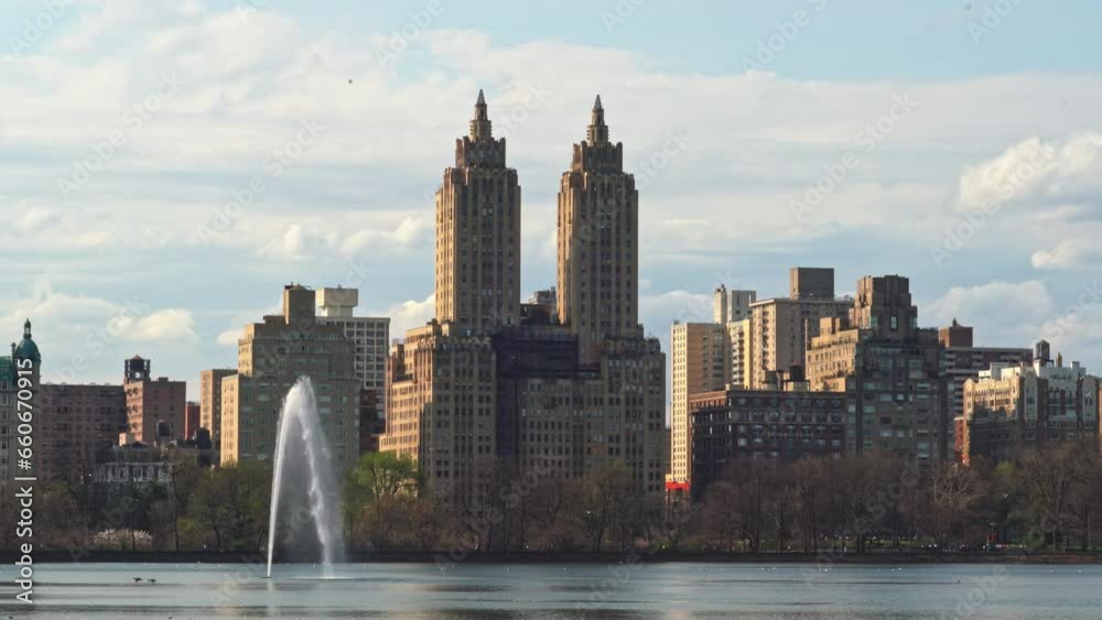 The view of Manhattan skyline from Central Park is breathtaking The view of Manhattan skyline from Central Park is breathtaking