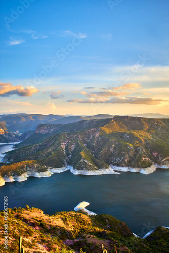 dam at sunrise in zimapan hidalgo, river between mountains in sunny day 