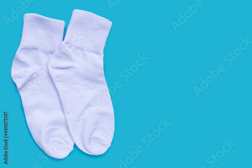 White socks on blue background.