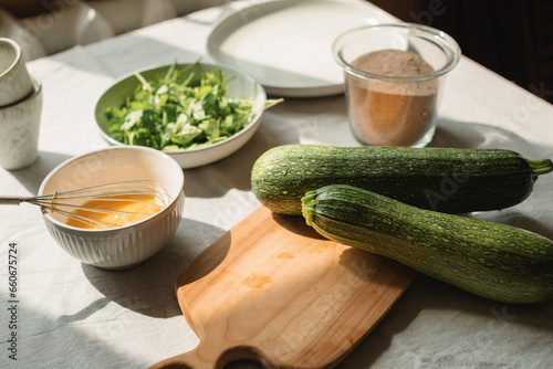 Overhead view of ingredients for making courgette fritters