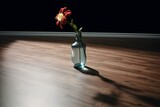 a flower in a vase on a floor. Generative AI