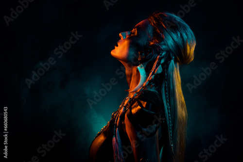 Photo of attractive cool mysterious lady wear viking clothes praying death gods isolated orange blue color background