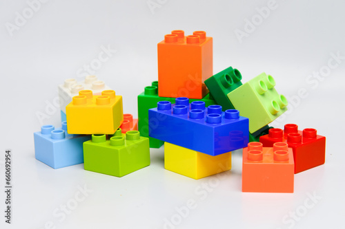 Pile plastic toy bricks of construction.