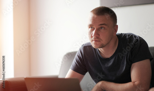 A Confident Look Of The Young Unsuccesful Entrepreneur Man with Blonde Hair and Blue Like Ocean Eyes 