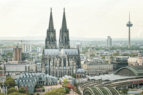city view of cologne with cathedral, main station and museum ludwig  photo