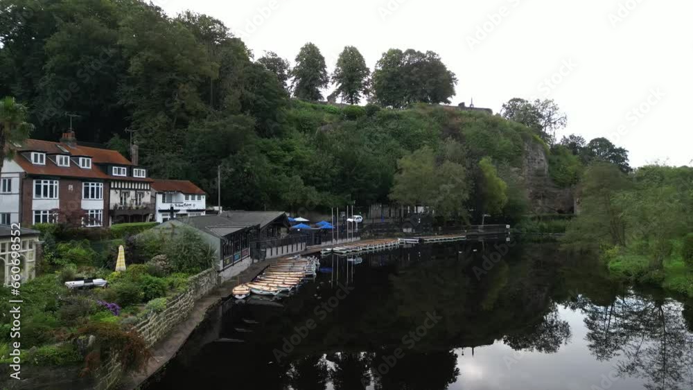 Boats moored to the quay on the River Nidd in Knaresborough, UK. Boats moored to the quay on the River Nidd in Knaresborough, UK.