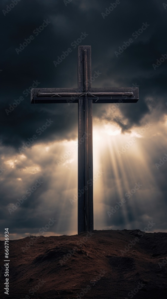 A cross standing tall against a stormy sky, with a ray of divine light breaking through the dark clouds.