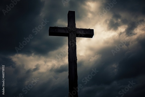 Closeup of a Cemetery Cross, standing tall against a dramatic stormy sky. The crosss silhouette creates a powerful and somber image, reflecting the cycles of life and the inevitability of