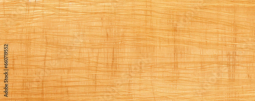 Texture of papyrus showcasing thin, delicate lines in shades of honey and cinnamon, creating a subtle, intricate pattern. The surface is slightly textured and has a warm and earthy tone.