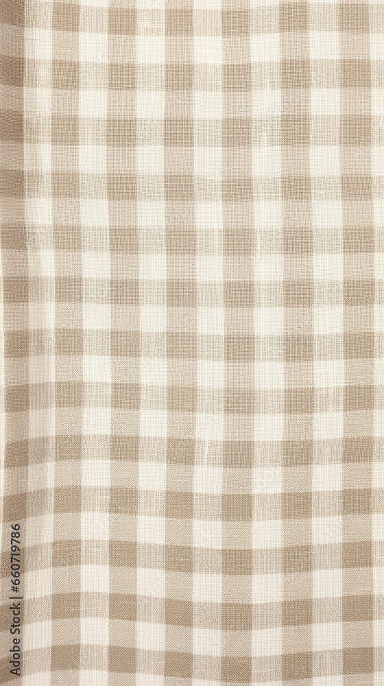 Texture of gingham fabric in a neutral color palette, showcasing a small, finely woven check pattern in shades of taupe and beige, with a durable and easytocarefor nature.
