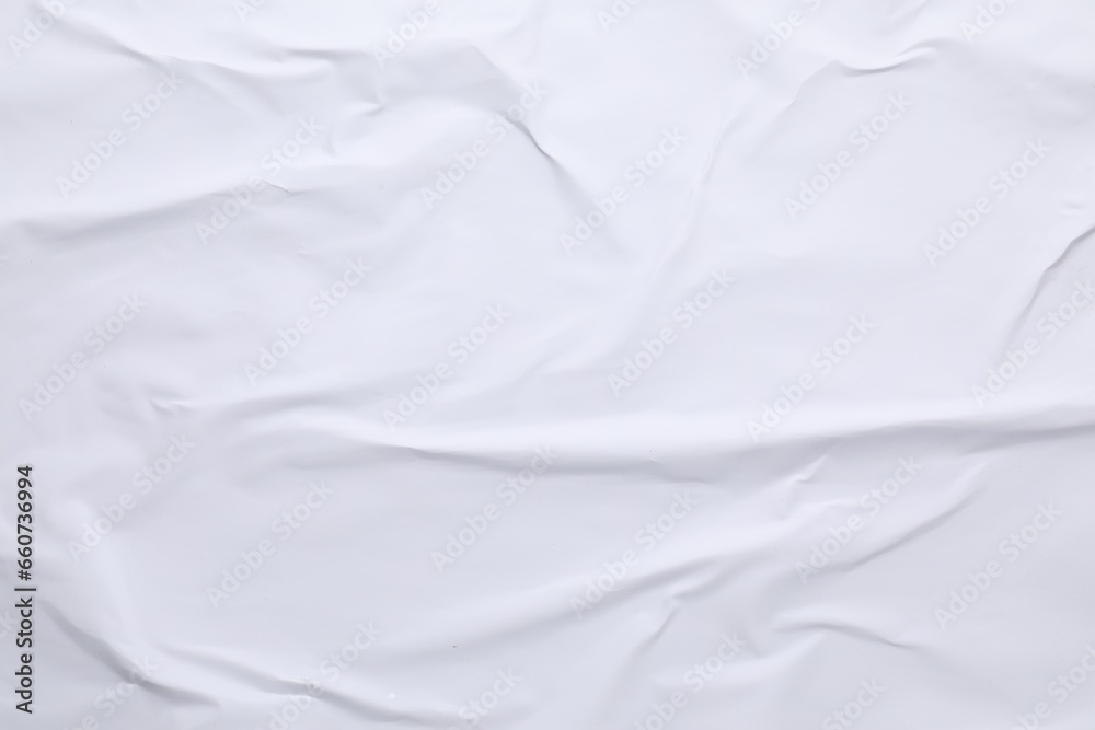 White crumpled sheet of paper as background, top view. Wall poster White crumpled sheet of paper as background, top view. Wall poster