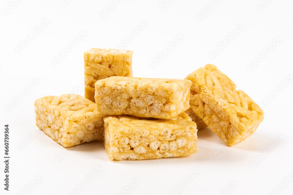 Chinese traditional dessert caramel treats or sachima isolated on white background. Chinese traditional dessert caramel treats or sachima isolated on white background.