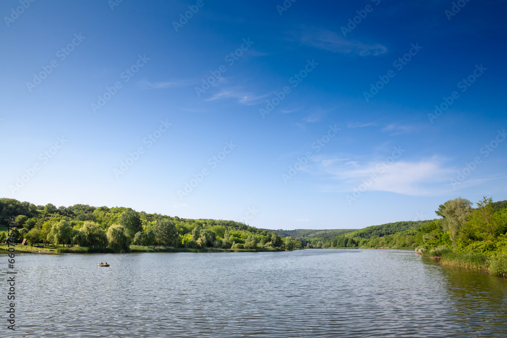 Panorama of Jezero bruje, or bruje lake, in Fruska Gora, in Serbia, Europe, in summer, in a sunny afternoon. it is a major natural landmark of Vojvodina near Erdevik. Panorama of Jezero bruje, or bruje lake, in Fruska Gora, in Serbia, Europe, in summer, in a sunny afternoon. it is a major natural landmark of Vojvodina near Erdevik.