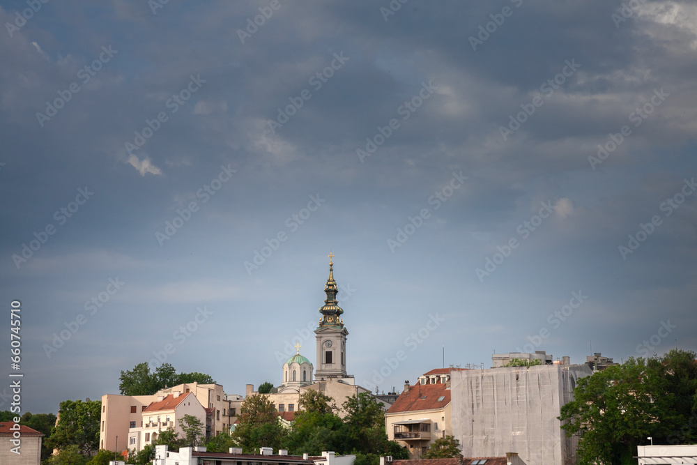 Saint Michael Cathedral, also known as Saborna Crkva, with its iconic clocktower seen from a street of Stari Grad district. It is one of the main landmarks of Belgrade, Serbia. Saint Michael Cathedral, also known as Saborna Crkva, with its iconic clocktower seen from a street of Stari Grad district. It is one of the main landmarks of Belgrade, Serbia.