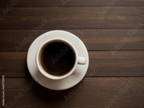 Top view of a cup of coffee on the wooden table  coffee background with copy space