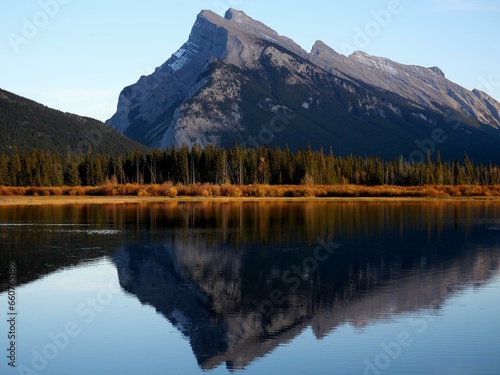 Natural reflection with Mount Rundle in the background at Banff National Park