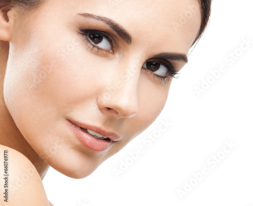 Face portrait photo of beautiful young woman, isolated over white background. Studio image of brunette beauty girl looking at camera.