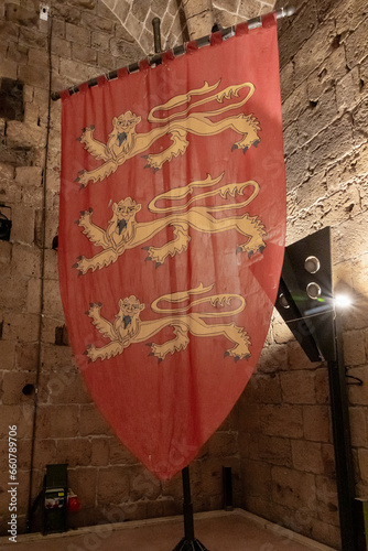 A replica of one of the Templar flags stands in the dining room at the Templar fortress in the Acre old city in northern Israel photo