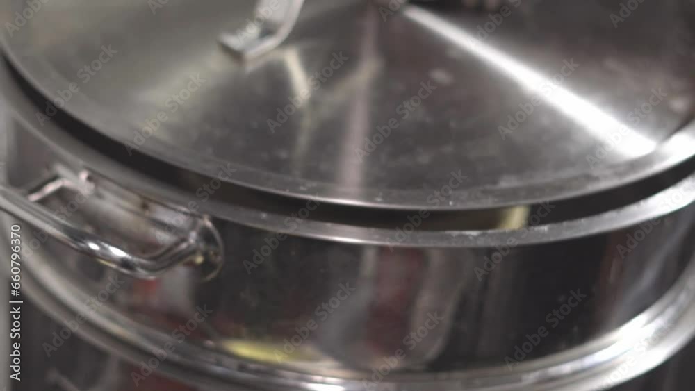 chef dim sim recipe putting in steemer closeup view chef dim sim recipe putting in steemer closeup view