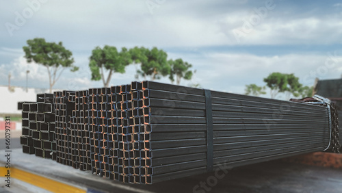 Metal profile pipe of rectangular cross section in packs at the warehouse of metal products