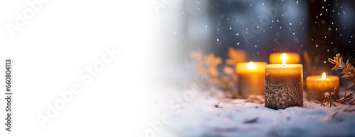 雪の中のろうそくの火 Candle fire in snow winter photo