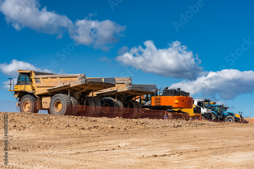 Large earth transport trucks for construction sites,