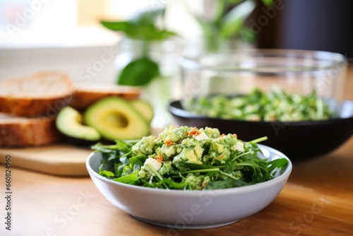 avocado salad with toasted bread in background
