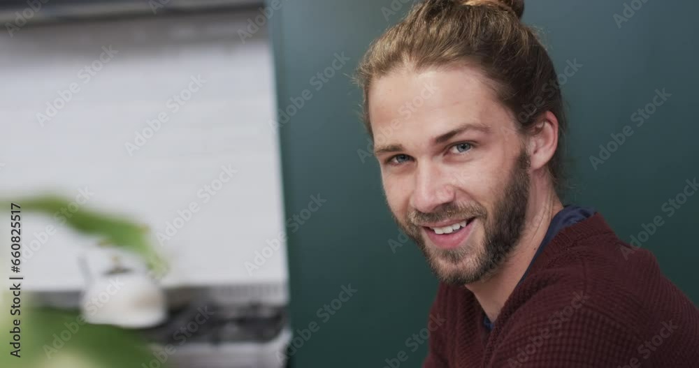Portrait of happy caucasian man using smiling in kitchen at home, slow motion, copy space Portrait of happy caucasian man using smiling in kitchen at home, slow motion, copy space