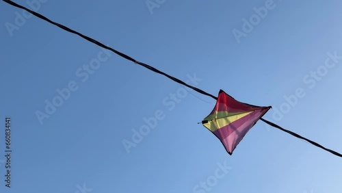 kite stuck in the electric power lines
