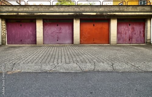 Fotografering Colorated garages in worker village of Crespi d'Adda, Lombardy, Italy