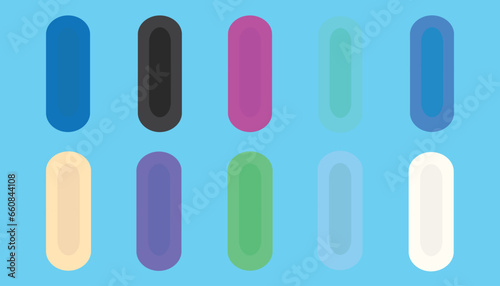 ten colored pills isolated on light blue. colored medicines