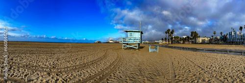 Panoramic view of the famous beach and Californian lifeguard house of Santa Monica, this is a very famous place for being the scene of movies and series.